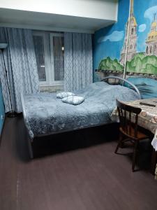 
Кровать или кровати в номере ЛИМОН на Есенина 30
