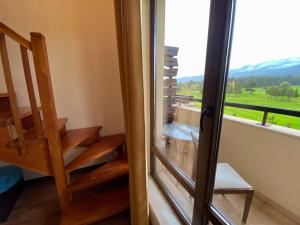 Nespecifikovaný výhled na hory nebo výhled na hory při pohledu z aparthotelu