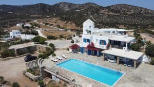 an aerial view of a villa with a swimming pool at The Aegean Horizon Villa in Grótta