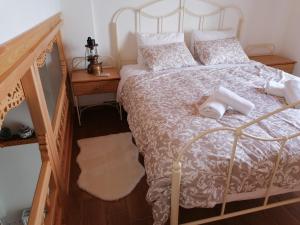 Postel nebo postele na pokoji v ubytování Amphitrite Apartments Skyros