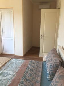 Postel nebo postele na pokoji v ubytování Guest House Marani