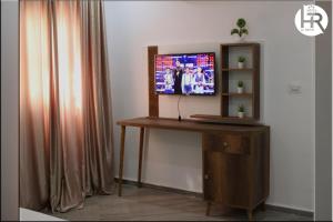 TV/Unterhaltungsangebot in der Unterkunft Hotel al rayan