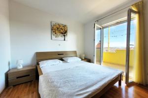 Posteľ alebo postele v izbe v ubytovaní Villa KRNIĆ- Solin, Split with a heated pool