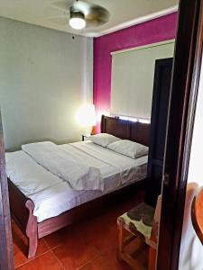 Postel nebo postele na pokoji v ubytování Cabañas San Miguel