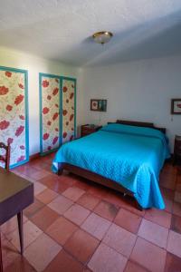 Voodi või voodid majutusasutuse 3 bedrooms house with shared pool garden and wifi at Porto de Mos toas