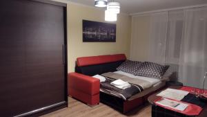 Posteľ alebo postele v izbe v ubytovaní Apartament Elegant