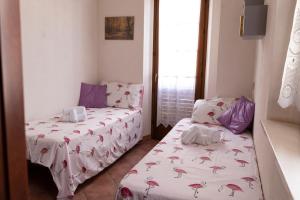 A bed or beds in a room at La Palma