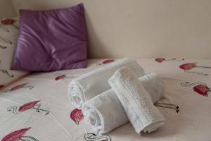 A bed or beds in a room at La Palma