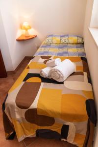 A bed or beds in a room at La Palma