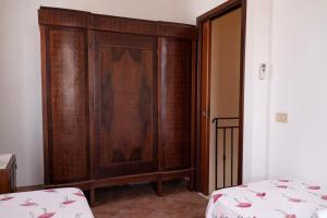 A bed or beds in a room at La Palma