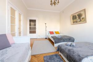Katil atau katil-katil dalam bilik di The Essence Of Łodz &Large Stylish Apartment