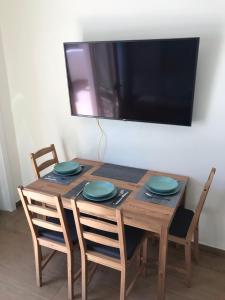 TV a/nebo společenská místnost v ubytování CASA BLANQUI
