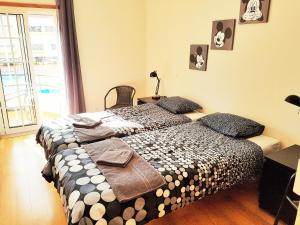 En eller flere senge i et værelse på Solario da Praia holiday apartment + 23 billeder