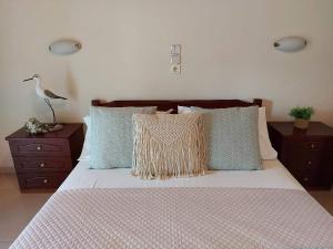 A bed or beds in a room at Antonio Studios