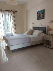 A bed or beds in a room at Antonio Studios