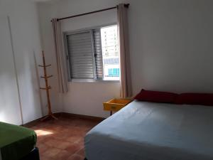 Krevet ili kreveti u jedinici u objektu Apartamento Praia Grande- SP Vila Tupi