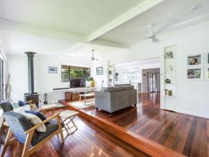 a living room with a couch and a fireplace at My Luka at Iluka in Iluka