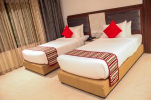 Voodi või voodid majutusasutuse Hotel Starlight toas