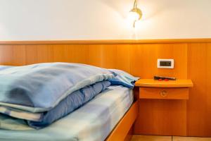 Postel nebo postele na pokoji v ubytování Appartamenti Ciesa Padon
