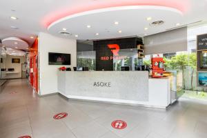 a asoya store with a counter in a building at Red Planet Bangkok Asoke - SHA Extra Plus in Bangkok