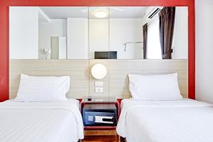 Letto o letti in una camera di Red Planet Bangkok Asoke - SHA Extra Plus