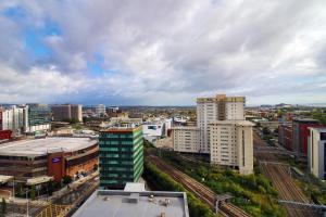 a view of a city with tall buildings at The View - LONG STAY OFFER - Modern Central Apartment and Parking by CTO Serviced Apartments in Cardiff