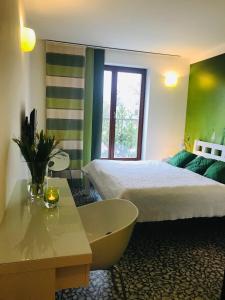 Postel nebo postele na pokoji v ubytování Design Hotel Romantick