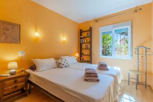 A bed or beds in a room at Casa dos Leones Még 21 kép