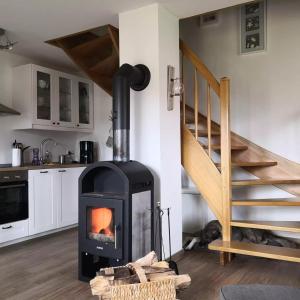 Dapur atau dapur kecil di Ferienhäuser Gut Gustrowerhöfen