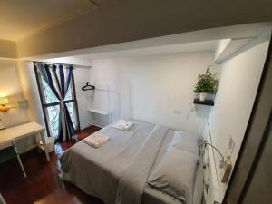 Postel nebo postele na pokoji v ubytování Home16 Sukhumvit16