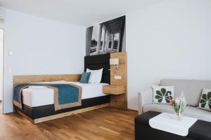 Postel nebo postele na pokoji v ubytování Parks 73 The Townhouse Hotel
