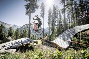 a man doing a trick on a bike over a ramp at Haus Elena in Sautens