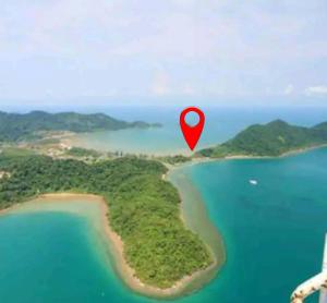 a map of an island in the ocean with a red marker at vitamin sea villas in Ko Chang
