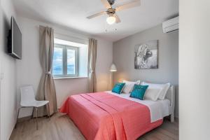 Postel nebo postele na pokoji v ubytování Villa Lukrecija Stonehouse