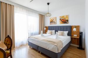 Posteľ alebo postele v izbe v ubytovaní Pension Laubenhof