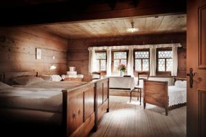 Postel nebo postele na pokoji v ubytování Landgasthof Ruedihus + 12 fotografií
