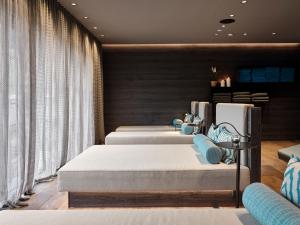 Ένα ή περισσότερα κρεβάτια σε δωμάτιο στο Hotel Hasenauer 4 Sterne Superior