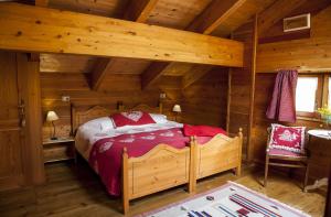 Un pat sau paturi într-o cameră la Agriturismo Alagna