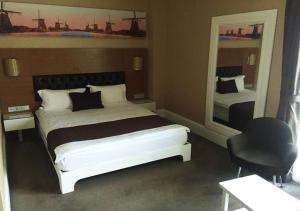 Giường trong phòng chung tại City Hotel Plovdiv