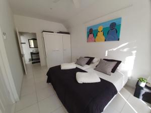 Ένα ή περισσότερα κρεβάτια σε δωμάτιο στο B2 APARTMENT with Balcony at JAN THIEL Curacao