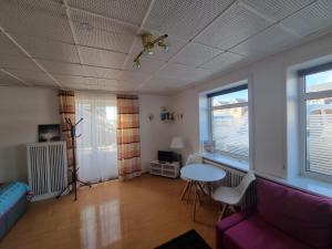 a living room with a couch and a table at Mein Urlaub auf Sylt in Westerland (Sylt)