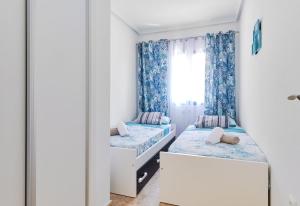 A bed or beds in a room at Apartment Eunice