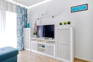A television and/or entertainment centre at Apartment Eunice