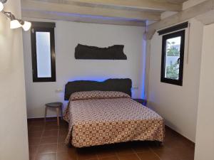 Postel nebo postele na pokoji v ubytování Villa Sunset Faro Deluxe & Spa Pool