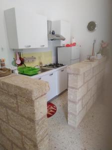 A cozinha ou kitchenette de E case tu Bertu