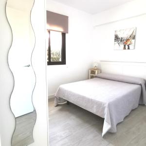 Ein Bett oder Betten in einem Zimmer der Unterkunft Brisa marina novo sancti petri