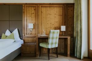 Postel nebo postele na pokoji v ubytování Hotel Tauernhof