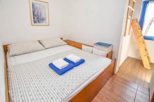 Postel nebo postele na pokoji v ubytování House Serenity