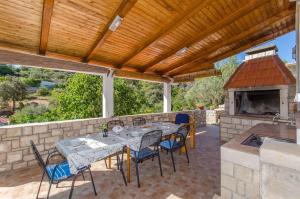 Patio alebo iná vonkajšia časť ubytovania House Isabella
