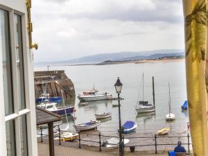 a view of a harbor with boats in the water at Old Ship Aground in Minehead